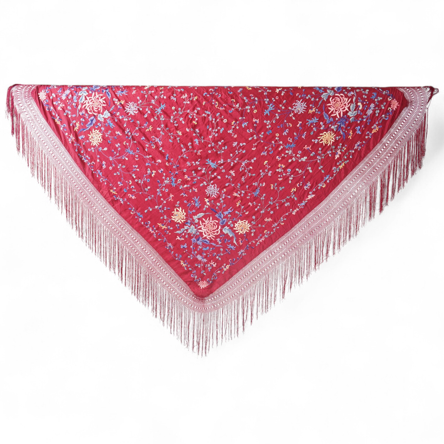 A late 19th early 20th century Chinese silk polychrome embroidered shawl on a maroon silk background. Fringed. 180cm x 60cm. Condition - no fading to colours, silk good